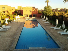  2 bedrooms appartement with shared pool enclosed garden and wifi at Marrakech  Марракеш